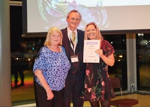 Zara receiving the UKABIF Stephen McAleese Award for Inspiration 2025